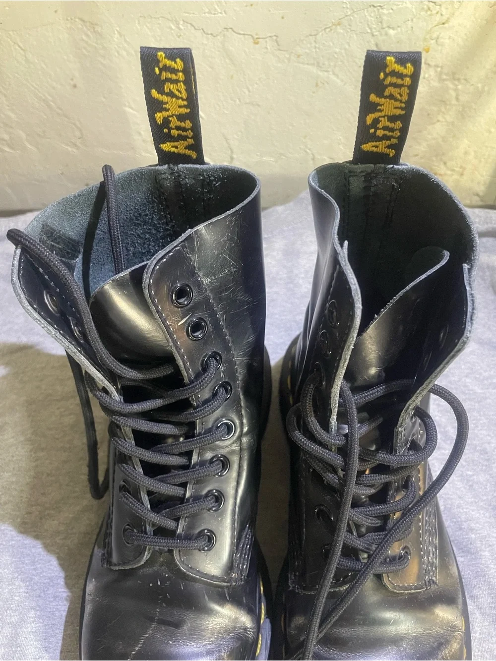 Dr. Martens Black Leather Lace-Up Boots with Yellow Stitching